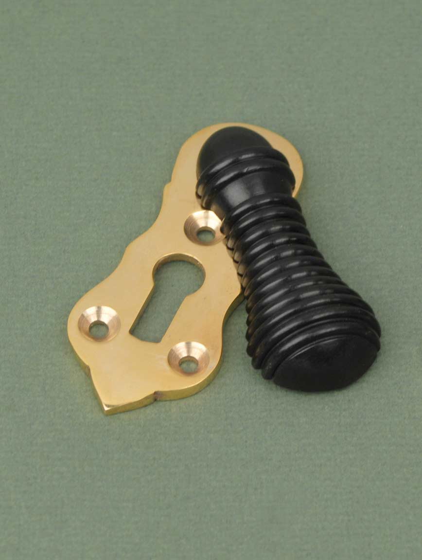 An image of Ebony Beehive - Escutcheon - Polished Brass